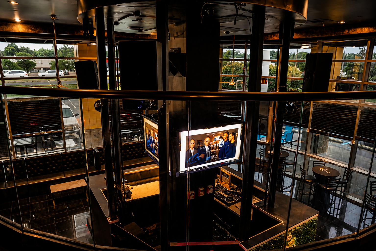 Cinematic interior photograph of a multi-level ultra lounge